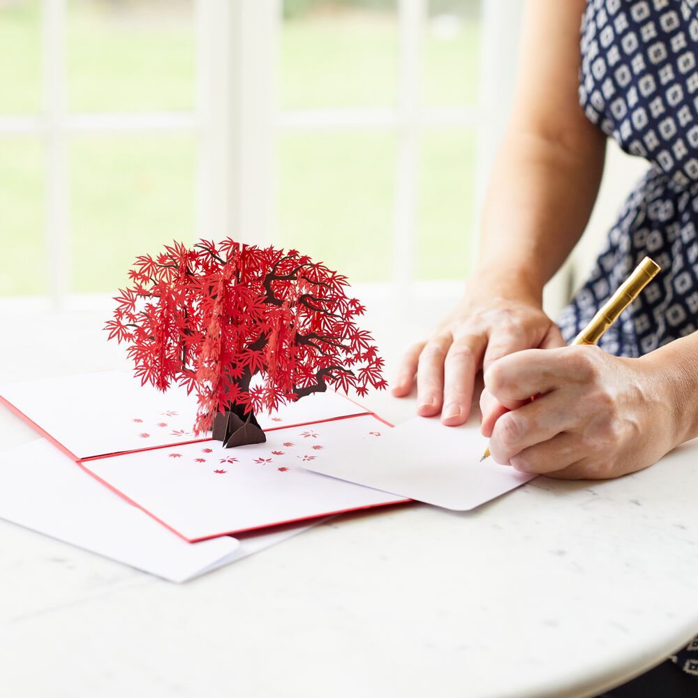 A red Japanese Maple Tree is revealed in this Lovepop Pop Up card.
