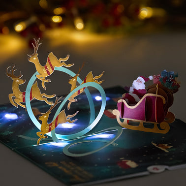 Magic of Christmas Santa's Sleigh Light-Up Pop-Up Card
