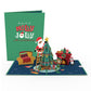 Santa Decorating a Christmas Tree Pop-Up Card