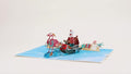 Flamingo Sleigh Ride Pop-Up Card